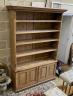A Victorian stripped pine open fronted bookcase cupboard, length 150cm, depth 42cm, height 214cm                                                                                                                            