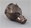 A late 18th century carved treen stirrup cup, modelled as a boar's head with inset tusks, 4.5in.                                       