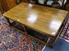 A large oak rectangular topped coffee table W.144cm.                                                                                   