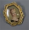 An 18k gold mounted miniature portrait pendant brooch, decorated with the bust a young lady, 38mm.                                     