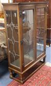 A glazed display cabinet                                                                                                               