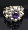 An antique gold, amethyst, garnet and pearl set cluster ring, size M.                                                                  