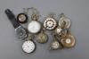 A small group of assorted pocket watches etc including a silver open face pocket watch and a globe watch.                                                                                                                   