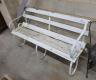 A painted wrought iron slatted wood garden bench, length 154cm, depth 46cm, height 82cm                                                                                                                                     