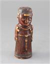 A late 19th century Benin carved ivory figure of a priest, height 6.5in.                                                               