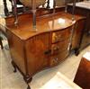 A 1920's mahogany serpentine sideboard W.136cm                                                                                         