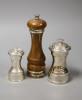 Two silver pepper mills and a silver-mounted wooden pepper mill (3)                                                                                                                                                         