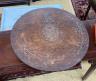 An early 20th century carved oak lazy Susan modelled on King Arthur’s round table, diameter 55cm, height 14cm                                                                                                               