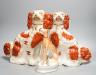 A pair of Victorian Staffordshire Spaniel chimney dogs and a greyhound, chimney dogs 31 cms high.                                                                                                                           