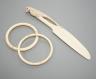 A late 19th century carved ivory ‘parrot’ paper knife and two Japanese carved Ivory bangles, paper knife 22 cms long.                                                                                                       