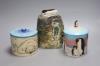 Two Sally Tuffin jars and covers for Dennis China Works, a Kath Bonson pottery vase of a cyclist                                                                                                                            