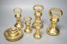 A set of 5 Victorian graduated cast brass bell weights and 3 graduated cast brass disc weights (8) 18cm                                                                                                                     