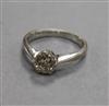 An 18ct white gold and solitaire diamond ring, size L.                                                                                 