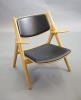 Hans Wegner for Carl Hansen, an oak and oak laminate framed ‘Sawback’ armchair, 73cm high, 52cm deep, 76cm high                                                                                                             