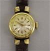 A Longines lady's 18ct gold wrist watch                                                                                                