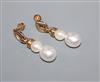 A pair of 9ct gold and South Sea Island cultured pear drop earrings, overall 38mm.                                                     