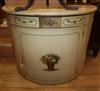 A cream painted demi-lune cabinet W.107cm                                                                                              