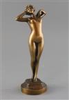 Leon-Louis Oury (1867-1940). A bronze figure of a stretching female nude, 9.75in.                                                      