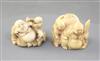 Two Japanese ivory netsuke of Hotei and a boy, Meiji period, width 4.1cm                                                               