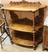 A Victorian walnut three tier whatnot W.107cm                                                                                          