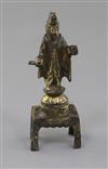 A small Chinese gilt bronze figure of a Daoist deity possibly Yuanshi Tianzun, Tang dynasty (AD 618-907), h. 11cm                      