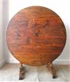 A 19th century French Vendange dining table in pine, cherry and oak Diameter 100cm                                                     