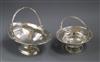 Two early 20th century silver sweetmeat baskets, largest length 18cm.                                                                  