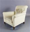 A Howard and Sons club armchair,                                                                                                       