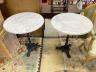 A pair of Victorian style cast iron circular marble topped pub tables, diameter 64cm, height 72cm                                                                                                                           