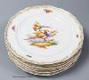 A set of six Meissen dessert dishes, painted with birds,factory seconds, 25.5cm diameter                                                                                                                                    