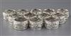 A set of twelve Tiffany & Co sterling silver napkin rings, 11.3 oz.                                                                    