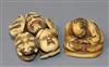 A Japanese ivory netsuke carved with nine Noh masks and another of a seated man asleep, both signed (2)                                