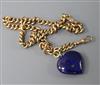 An Edwardian 9ct gold curb link albert and a lapis lazuli heart pendant, 20.4 grams.                                                   