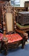 A pair of Thai carved hardwood "Throne" chairs W.92cm                                                                                  