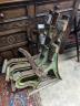 An early 20th century cast iron three section bench frame, probably marine or municipal, height 85cm                                                                                                                        