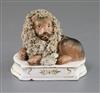 A Lloyd Shelton porcelain group of a lion and a lamb, c.1840, length 12cm, shallow foot chip                                           