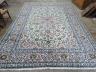 A Kashan pale green ground carpet, 410 x 296cm                                                                                                                                                                              