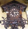 A Black Forest cuckoo clock H.53cm. W.43cm.                                                                                            