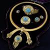 A Victorian gold, turquoise cluster and diamond set parure, in original leather case, necklace approx. 44cm.                           