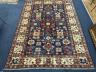 A Kazak blue ground carpet, 242 x 186cm                                                                                                                                                                                     