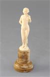 Joe Descamps. A 1930's carved ivory figure of a nude, height 5.75in.                                                                   