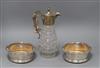 A plated glass claret jug and a pair of silver plated wine coasters                                                                    