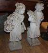 A pair of reconstituted stone garden figures tallest 77cm                                                                              