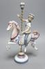 A Lladro figure, Boy on a Carousel Horse, height 39cm H 39cm                                                                                                                                                                