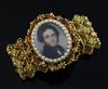 A Victorian gold (tested as 18ct) pierced link mourning bracelet, with inset oval oil on ivory portrait miniature of a gentleman       