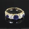 An early 20th century gold and platinum, sapphire and diamond five stone half hoop ring, size L.                                       