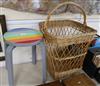 A wicker basket and a painted stool                                                                                                    