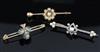 Three assorted Victorian gold and gem set bar brooches, largest approx. 49mm.                                                          