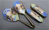 An enamelled four piece dressing table set                                                                                             