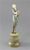 An Art Deco cold painted bronze and ivory figure of a Society lady, height 8.5in.                                                      
